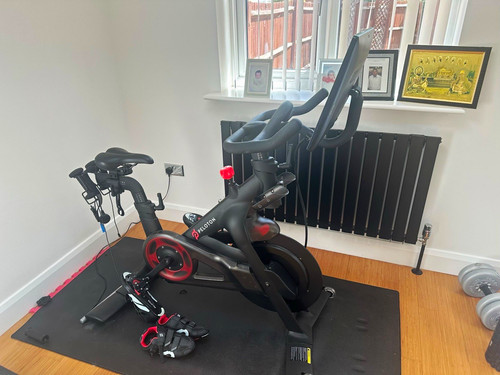Peloton bike with - peloton, mat